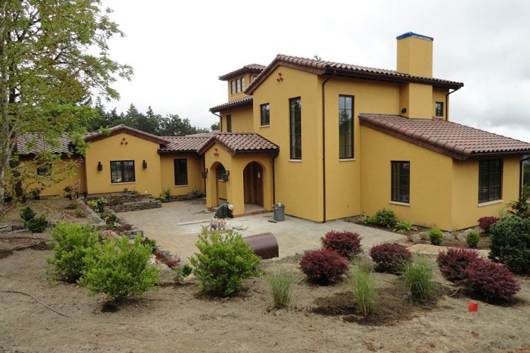 Mission Style Home with tile roof