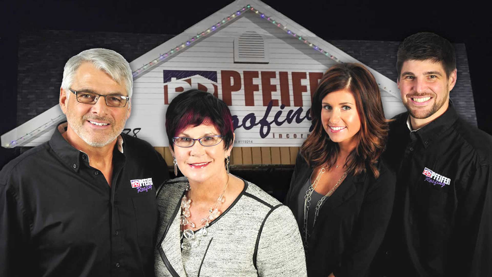 Pfeifer-owners-in-front-of-sign