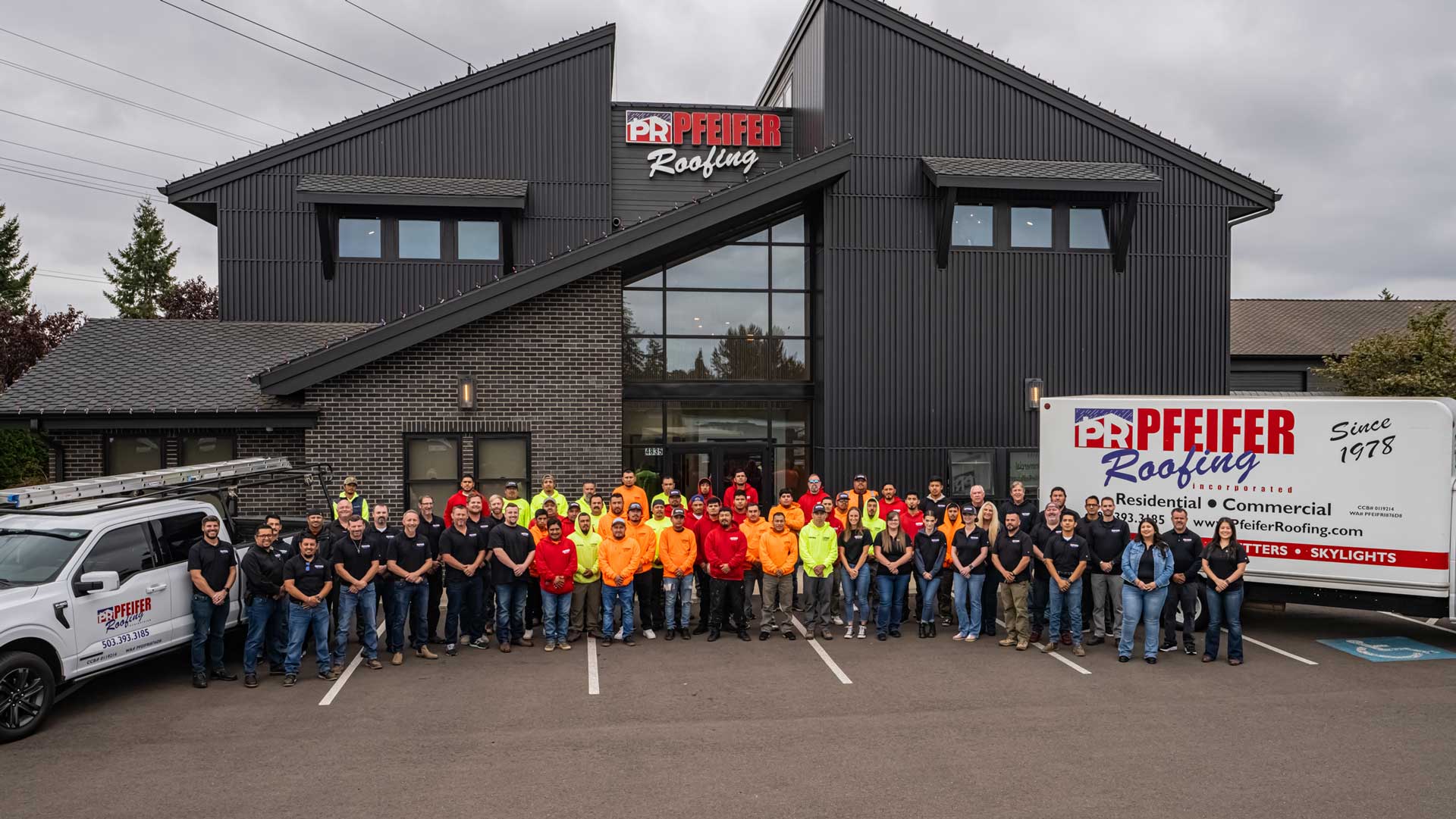pfeifer-team-in-front-of-building